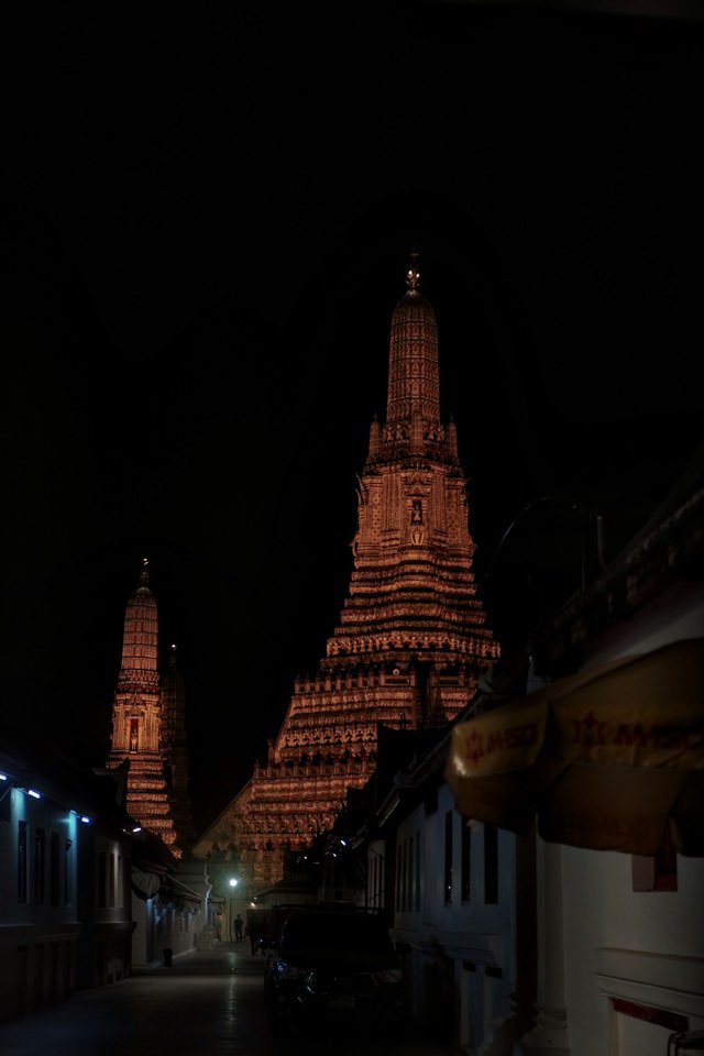 Wat Arun illuminated at night in Bangkok