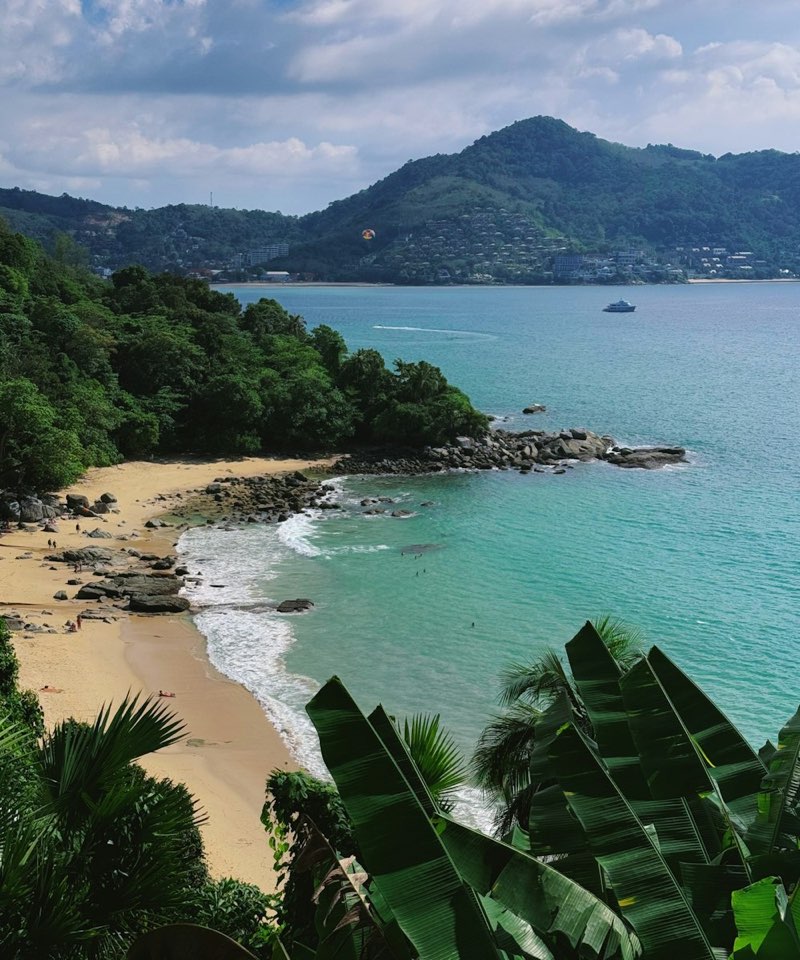 Kamala beach and green hills in Phuket